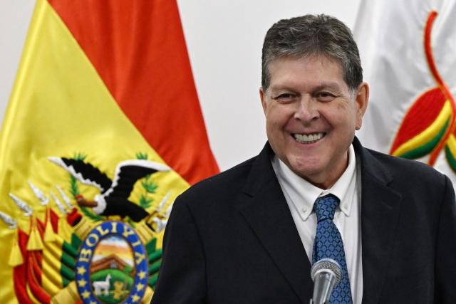 Bolivia's Minister of Hydrocarbons and Energy, Marcelo Blanco, smiles during a press conference at the Casa Grande del Pueblo in La Paz on September 2, 2026. The Bolivian government ordered the nationalization of the state-owned oil company YPFB amid a severe fuel supply crisis, according to a decree published in the official gazette. (Photo by Aizar RALDES / AFP)