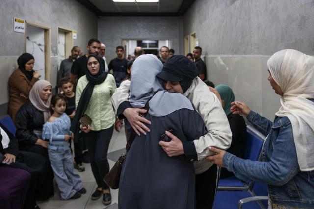 Relatives mourn during the funeral of two Palestinians killed in Al-Mughayyir, east of Ramallah, following an Israeli settler attack and subsequent Israeli army raid, at the Ramallah government hospital in the occupied West Bank on September 2, 2026. Violence by Israeli settlers towards Palestinians in the West Bank has persisted for years, often with little or no legal consequence, but recent months have seen a surge in attacks. More than 500,000 Israelis live in settlements in the Palestinian territory, which are illegal under international law, among some three million Palestinians. Israel has occupied the West Bank since 1967. (Photo by Zain JAAFAR / AFP)