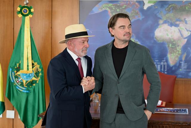 Brazil's President Luiz Inacio Lula da Silva (L) and US actor Leonardo DiCaprio pose for a photograph during a meeting at the Planalto Palace in Brasilia on September 2, 2026. (Photo by Evaristo Sa / AFP)