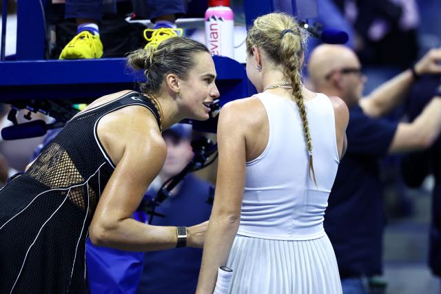 Belarus's Aryna Sabalenka speaks with Russia's Polina Iatcenko after defeating her during the women's singles second round tennis match on day four of the US Open tennis tournament at the USTA Billie Jean King National Tennis Center in New York City on September 2, 2026. (Photo by CHARLY TRIBALLEAU / AFP)