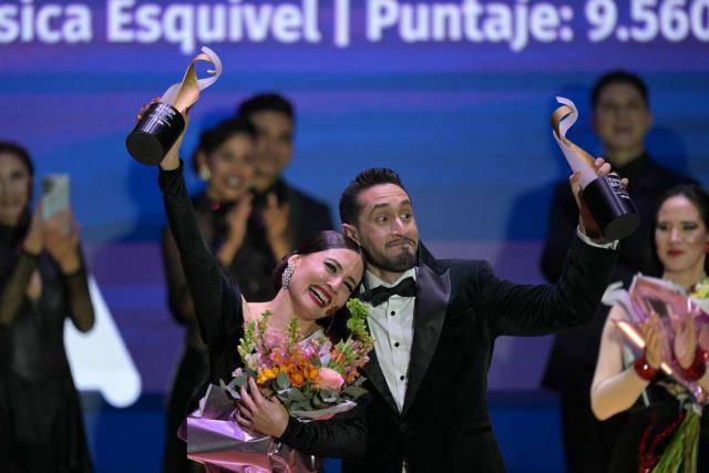 Nicolas Schell and Nair Schinca celebrate after winning the final of the Stage Tango World Championship in Buenos Aires on September 2, 2026. (Photo by Juan MABROMATA / AFP)