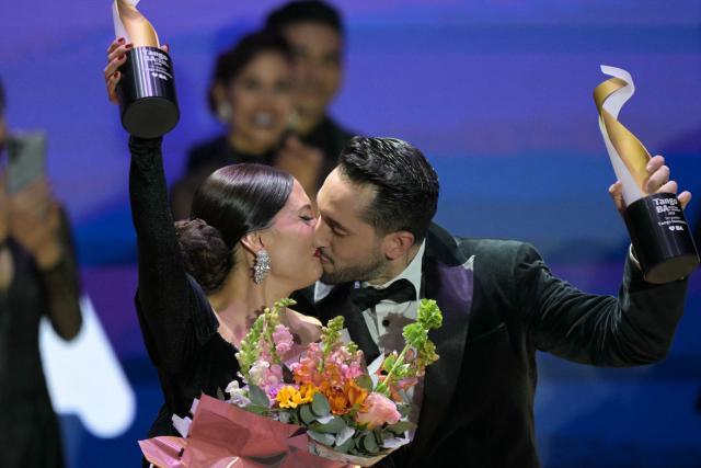 Nicolas Schell and Nair Schinca celebrate after winning the final of the Stage Tango World Championship in Buenos Aires on September 2, 2026. (Photo by Juan MABROMATA / AFP)