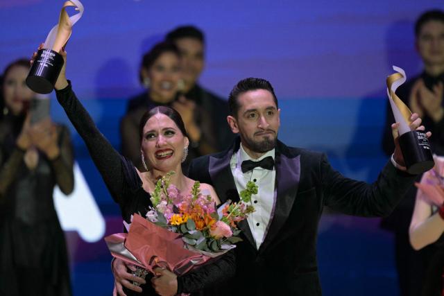 Nicolas Schell and Nair Schinca celebrate after winning the final of the Stage Tango World Championship in Buenos Aires on September 2, 2026. (Photo by Juan MABROMATA / AFP)