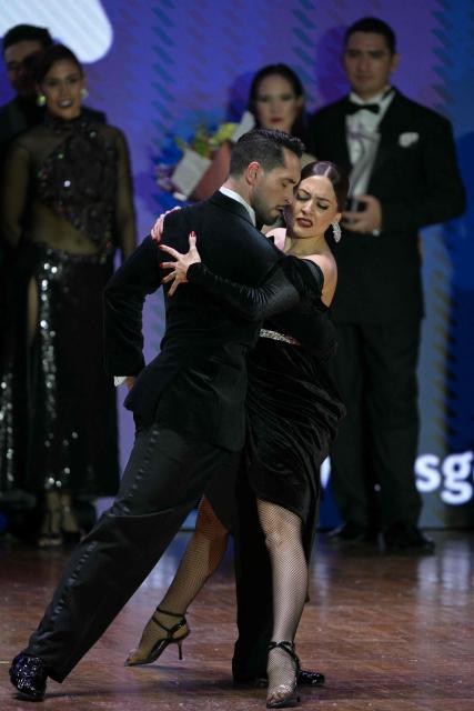 Nicolas Schell and Nair Schinca perform during the final of the Stage Tango World Championship in Buenos Aires on September 2, 2026. (Photo by Juan MABROMATA / AFP)