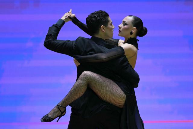 Facundo Vilches and Irina Cristoff Veleff perform during the final of Stage Tango World Championship in Buenos Aires on September 2, 2026. (Photo by Juan MABROMATA / AFP)