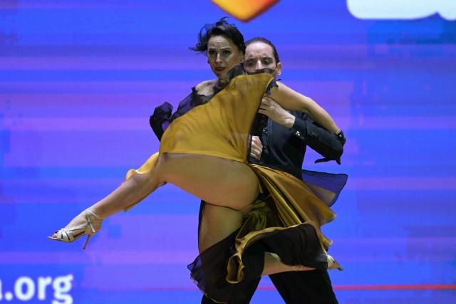 Federico Ibanez and Nuria Lazo perform for the fourth place during the final of Stage Tango World Championship in Buenos Aires on September 2, 2026. (Photo by Juan MABROMATA / AFP)