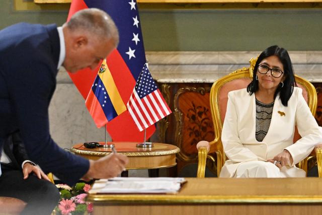 Venezuela's interim President Delcy Rodriguez (R) gestures during the signing of an oil agreement with US Energy Secretary Chris Wright (unseen) at the Miraflores Presidential Palace in Caracas on September 2, 2026. US Energy Secretary Chris Wright oversaw the signing of deals worth "tens of billions of dollars" between Venezuela and oil majors Chevron and ENI as well as with energy company GE Vernova on September 2, 2026. (Photo by Juan BARRETO / AFP)