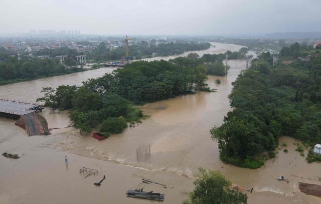 This aerial photo shows flood in Qianchuan, China's Central Jiangxi province on September 2, 2026. (Photo by CN-STR / AFP) / China OUT