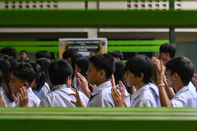 Students gather during a nationwide school drills to safeguard students from armed intruders, at a school in San Rafael, Bulacan on September 3, 2026. The drills came following a student livestreaming himself shooting another schoolmate dead before taking his own life at a high school in the Philippines on August 18, authorities said. (Photo by Jam STA ROSA / AFP)