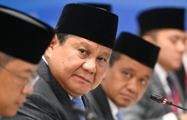In this pool photograph distributed by the Russian state agency Sputnik, Indonesian President Prabowo Subianto attends a meeting with Russia's President on the sidelines of the Eastern Economic Forum in Vladivostok on September 3, 2026. (Photo by Kristina Solovyova / POOL / AFP)