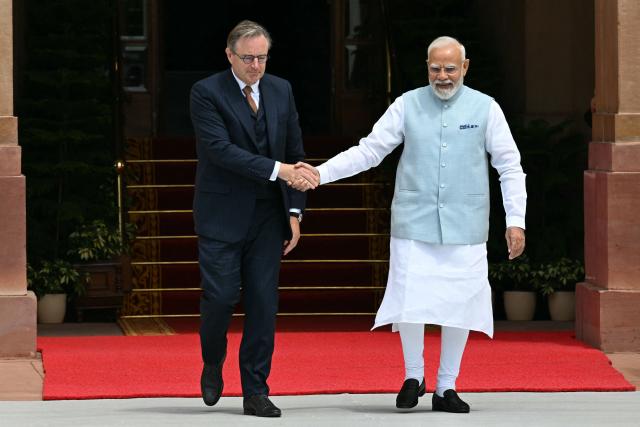 Belgian Prime Minister Bart De Wever shakes hands with his Indian counterpart Narendra Modi at the Hyderabad House in New Delhi on September 3, 2026. (Photo by Sajjad HUSSAIN / AFP)