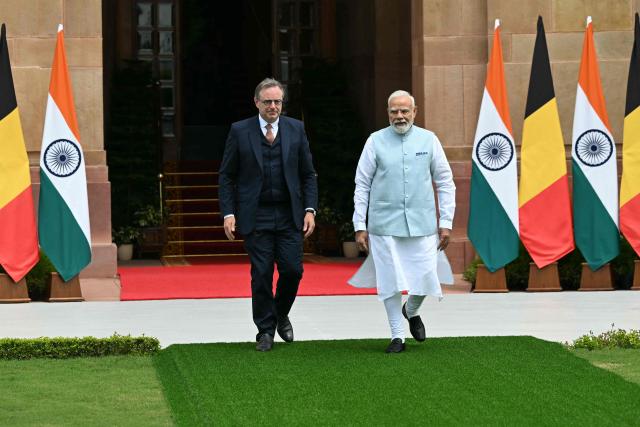 Belgian Prime Minister Bart De Wever walks with his Indian counterpart Narendra Modi at the Hyderabad House in New Delhi on September 3, 2026. (Photo by Sajjad HUSSAIN / AFP)