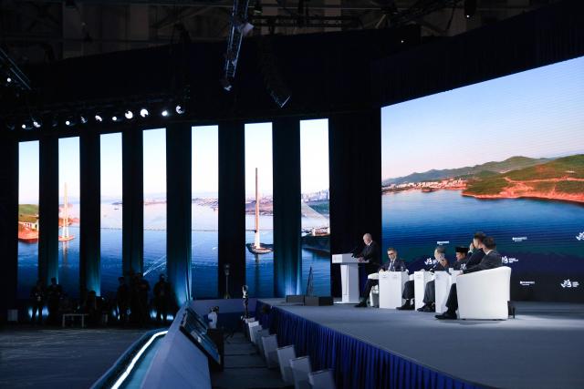 In this pool photograph distributed by the Russian state agency Sputnik, Russia's President Vladimir Putin gives a speech at the Eastern Economic Forum in Vladivostok on September 3, 2026. (Photo by Vyacheslav PROKOFYEV / POOL / AFP)