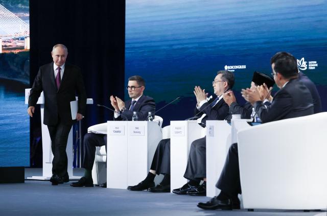 In this pool photograph distributed by the Russian state agency Sputnik, Russia's President Vladimir Putin attends the Eastern Economic Forum in Vladivostok on September 3, 2026. (Photo by Vyacheslav PROKOFYEV / POOL / AFP)