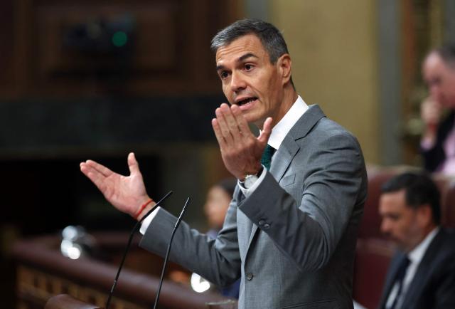 Spain's Prime Minister Pedro Sanchez addresses the congress of deputies on the government's handling of the situation in Spain's North African enclave Ceuta after a mass influx of migrants, at the lower house of parliament in Madrid on September 3, 2026. More than 70,000 migrants crossed into Ceuta from Morocco on July 30 and 31 in a surge that left scores dead, most by drowning as they tried to swim around a breakwater. Moroccan security forces displayed "total permissiveness" during the unprecedented migrant rush into Spain's north African territory of Ceuta in July, according to a Spanish police report seen by AFP on Wednesday. The findings risk embarrassing Spain's leftist government, which has avoided blaming Morocco for the crisis and striven to improve delicate relations with Rabat. (Photo by Thomas COEX / AFP)