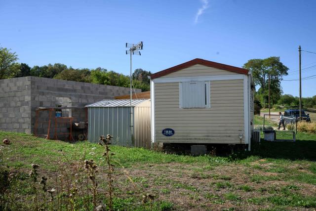 A photo shows a mobile home at a residence following the discovery of the bodies of four members of the same family, including two children aged six and nine, in Gy, eastern France on September 3, 2026. The bodies were found in the evening of September 2, 2026, after a man reportedly killed his two children and his mother-in-law before commiting suicide. According to people close to him, the man filmed the scene and sent the footage to his partner, with whom he was in the process of separating. (Photo by ARNAUD FINISTRE / AFP)
