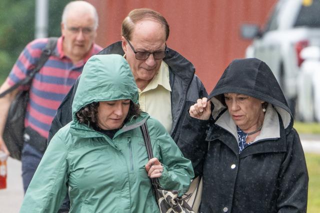 Paula Musgrove (R) and Michael Musgrove (C), parents of Lindsay Clancy, walk with Allison Ozga (L), sister of Lindsay Clancy, as they arrive at the courthouse as the jury deliberation phase continues in Lindsay Clancy's murder trial at the Plymouth County Superior Court in Plymouth, Massachusetts, on September 3, 2026. Lindsay Clancy is on trial for the January 2023 strangulation deaths of her three young children. (Photo by Rick Friedman / AFP)