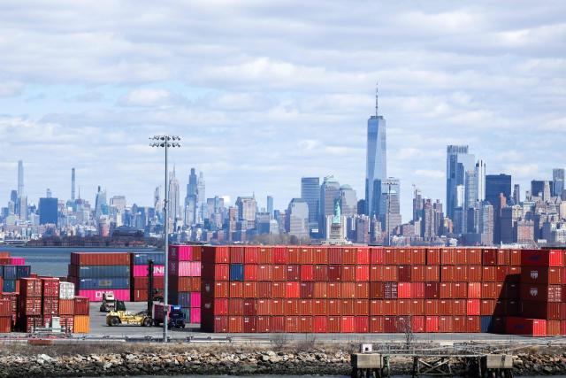 (FILES) Shipping containers are seen at the Port Jersey Container Terminal, with the Manhattan skyline in the distance, in Jersey City, New Jersey on April 8, 2025. The US trade deficit in July 2026 widened to its largest since March 2025, government data showed on September 3, 2026, as imports climbed on the back of the booming AI tech build-out. US trade has seen wide fluctuations since President Donald Trump returned to the White House last year and rolled out sweeping tariffs on allies and competitors, in efforts to narrow the trade gap. (Photo by CHARLY TRIBALLEAU / AFP)
