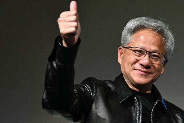 (FILES) Nvidia CEO Jensen Huang gives a thumbs up at a press conference with Japanese multinational information and communications technology company Fujitsu in Tokyo on July 16, 2026. Nvidia announced on September 3, 2026, that it will buy artificial intelligence platform Hugging Face for $12.9 billion, as the chipmaking giant seeks to diversify its hold on the AI sector. "I'm excited to announce that NVIDIA has agreed to acquire Hugging Face for $12,930,300,000. Together, we will scale Hugging Face's platform, strengthen its infrastructure and expand access to AI for developers and institutions worldwide," Nvidia CEO Jensen Huang said in a post on the company's website. (Photo by Philip FONG / AFP)