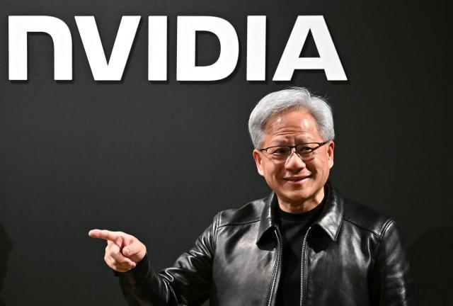 (FILES) Nvidia CEO Jensen Huang attends the Q&A session with the media during Nvidia/Japan AI Ecosystem Reception in Tokyo on July 16, 2026. Nvidia announced on September 3, 2026, that it will buy artificial intelligence platform Hugging Face for $12.9 billion, as the chipmaking giant seeks to diversify its hold on the AI sector. "I'm excited to announce that NVIDIA has agreed to acquire Hugging Face for $12,930,300,000. Together, we will scale Hugging Face's platform, strengthen its infrastructure and expand access to AI for developers and institutions worldwide," Nvidia CEO Jensen Huang said in a post on the company's website. (Photo by Philip FONG / AFP)