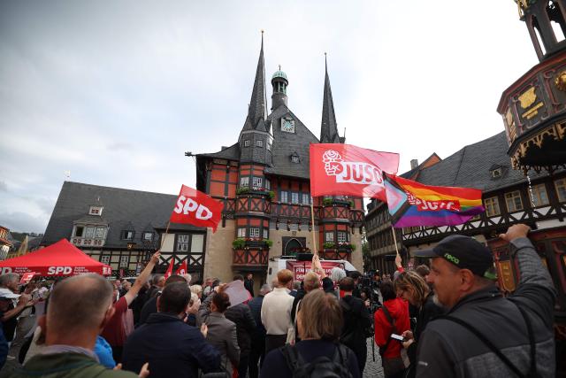 Supporters cheer during a campaign event of the Social Democratic Party (SPD) before the State elections in Saxony-Anhalt in Wernigerode, eastern Germany on September 3, 2026. The 2026 Saxony-Anhalt state election to elect the 9th Landtag of Saxony-Anhalt will be held on September 6, 2026. (Photo by Ronny HARTMANN / AFP)