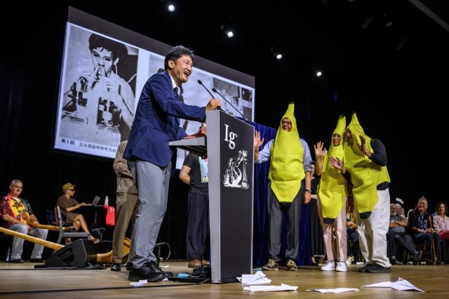 Japanese Doctor Miki Takahara speaks during the 2026 Ig Nobel Prize Ceremony in Zurich, on September 3, 2026. Miki Takahara accepted the Ig Nobel Medicine prize award on behalf of late Doctor Tokuji Unno for a study called "How to Blow the Nose — An Aerodynamic Study of the Nose Blowing". The Ig Nobel Prize is a parody of the Nobel Prize, which is awarded every autumn to celebrate ten unusual or trivial achievements in scientific research. (Photo by Fabrice COFFRINI / AFP)