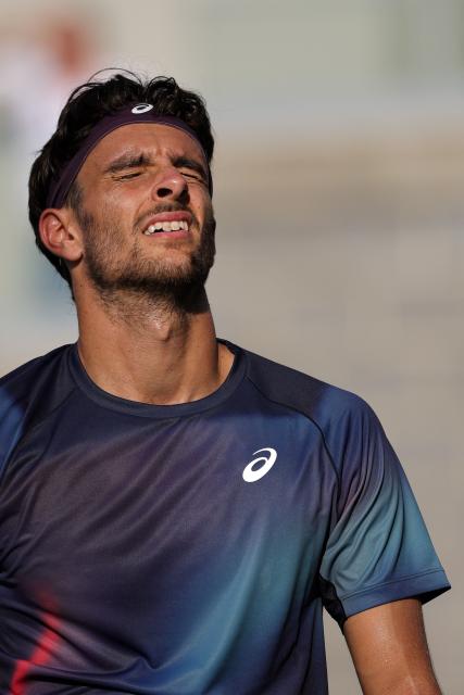 Italy's Lorenzo Musetti reacts during his men's singles second round tennis match against Australia's Dane Sweeny on day five of the US Open tennis tournament at the USTA Billie Jean King National Tennis Center in New York City on September 3, 2026. (Photo by KENA BETANCUR / AFP)