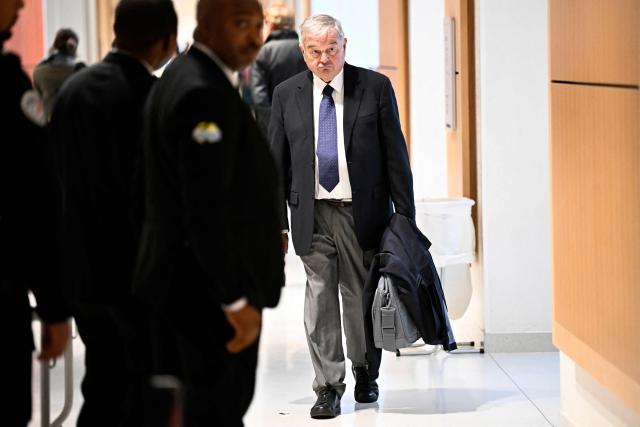 (FILES) French former minister and former treasurer of the centrist Democratic Movement (MoDem) party and MEP, Michel Mercier arrives for the start of his trial at the Judicial court of Paris in Batignolles, a northern district of Paris on October 16, 2023. The appeal trial of François Bayrou along with ten other people, for alleged complicity in the misappropriation of public funds in a scandal over MoDem European parliamentary assistants will run from September 9 to October 5, 2026. (Photo by JULIEN DE ROSA / AFP)