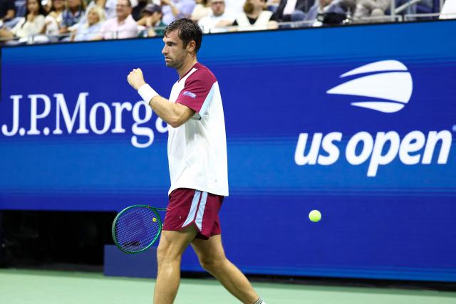 France's Quentin Halys reacts after a point during the men's singles second round tennis match against Germany's Alexander Zverev on day five of the US Open tennis tournament at the USTA Billie Jean King National Tennis Center in New York City on September 3, 2026. (Photo by CHARLY TRIBALLEAU / AFP)