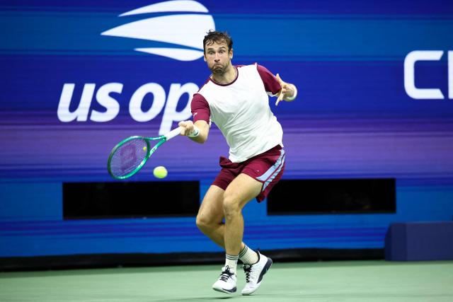 France's Quentin Halys hits a return during the men's singles second round tennis match against Germany's Alexander Zverev on day five of the US Open tennis tournament at the USTA Billie Jean King National Tennis Center in New York City on September 3, 2026. (Photo by CHARLY TRIBALLEAU / AFP)