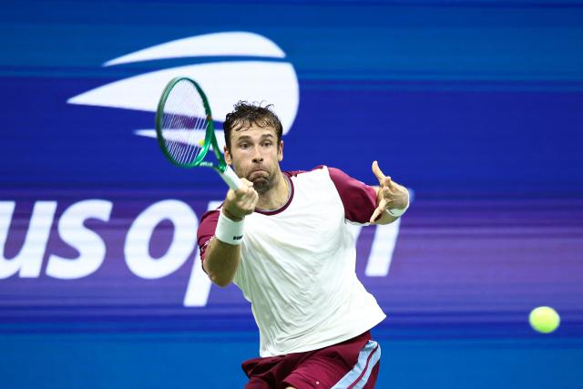 France's Quentin Halys hits a return during the men's singles second round tennis match against Germany's Alexander Zverev on day five of the US Open tennis tournament at the USTA Billie Jean King National Tennis Center in New York City on September 3, 2026. (Photo by CHARLY TRIBALLEAU / AFP)