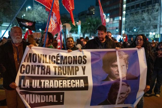 Demonstrators holds a sign against the Madrid Forum, a meeting of Latin American right-wing leaders, in Santiago on September 3, 2026. (Photo by Eduardo Vasquez / AFP)
