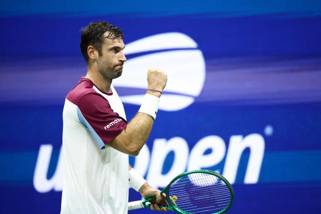 France's Quentin Halys reacts after a point during the men's singles second round tennis match against Germany's Alexander Zverev on day five of the US Open tennis tournament at the USTA Billie Jean King National Tennis Center in New York City on September 3, 2026. (Photo by CHARLY TRIBALLEAU / AFP)
