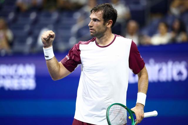 France's Quentin Halys reacts after a point during the men's singles second round tennis match against Germany's Alexander Zverev on day five of the US Open tennis tournament at the USTA Billie Jean King National Tennis Center in New York City on September 3, 2026. (Photo by CHARLY TRIBALLEAU / AFP)