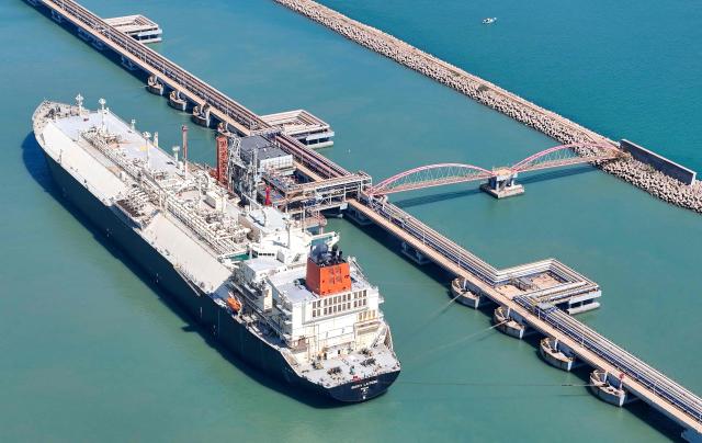 Gigira Laitebo tanker (L) unloads Liquefied Natural Gas (LNG) for Chinese state-owned oil and gas enterprise Sinopec, China Petroleum and Chemical Corporation in Qingdao, China's eastern Shandong province on September 3, 2026. (Photo by CN-STR / AFP) / China OUT