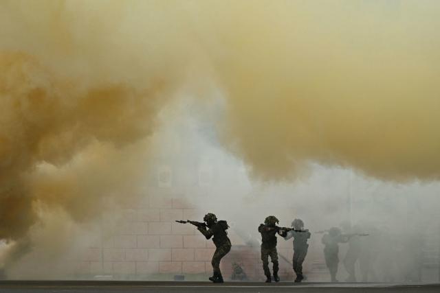Indian army cadets perform bunker-bursting drill ahead of a graduation ceremony at the Officers Training Academy in Chennai on September 4, 2026. (Photo by R.Satish BABU / AFP)