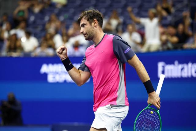 France's Quentin Halys reacts after winning the fourth set during the men's singles second round tennis match against Germany's Alexander Zverev on day five of the US Open tennis tournament at the USTA Billie Jean King National Tennis Center in New York City on September 3, 2026. (Photo by CHARLY TRIBALLEAU / AFP)