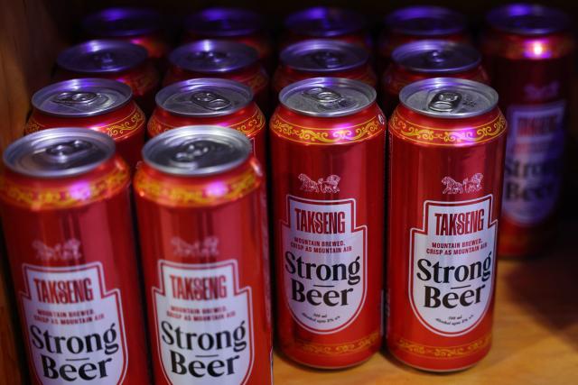 Cans of a local beer brand called Takseng are displayed at a store in Paro, Bhutan on September 3, 2026. (Photo by Niharika KULKARNI / AFP)