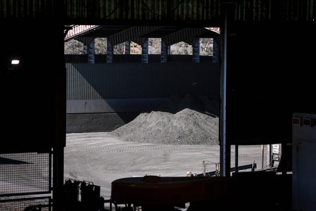 A pile of crushed copper sits in a storage facility after being processed in the processing mill located at the underground CSA Cobar copper mine, operated by Harmony Gold Mining company, located north of the New South Wales town of Cobar on September 4, 2026. (Photo by DAVID GRAY / AFP)