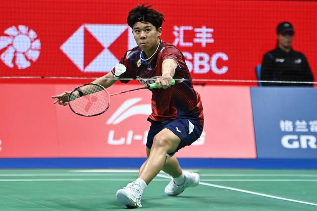 Thailand’s Supanida Katethong hits a return to Japan’s Akane Yamaguchi during their women's singles quarter-final match at the China Masters badminton tournament in Shenzhen, in China’s southern Guangdong province on September 4, 2026. (Photo by CN-STR / AFP) / China OUT