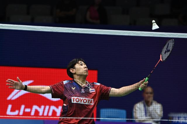 Thailand’s Supanida Katethong hits a return to Japan’s Akane Yamaguchi during their women's singles quarter-final match at the China Masters badminton tournament in Shenzhen, in China’s southern Guangdong province on September 4, 2026. (Photo by CN-STR / AFP) / China OUT