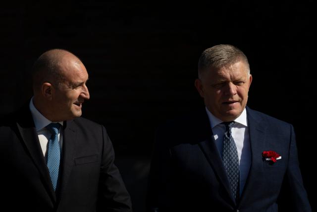 Bulgaria's Prime Minister Rumen Radev (L) and his Slovak counterpart Robert Fico attend a welcoming ceremony prior to bilateral talks in Sofia on September 4, 2026. (Photo by Nikolay DOYCHINOV / AFP)