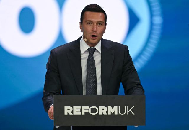 President of French far-right party Rassemblement National (RN) Jordan Bardella addresses delegates on the second day of the annual Reform UK party conference at the NEC in Birmingham, central England on September 4, 2026. (Photo by Paul ELLIS / AFP)