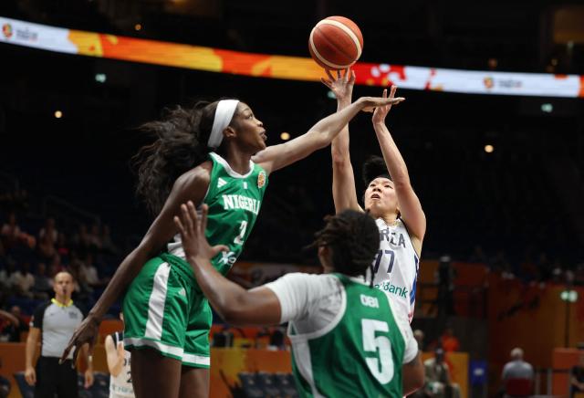 (L-R) Nigeria's center #25 Victoria Macaulay, Nigeria's forward #05 Jordan Obi and South Korea's center #77 Jin An vie for the ball during the 2026 FIBA Women's Basketball World Cup Group B match between South Korea and Nigeria at the Berlin Arena in Berlin on September 4, 2026. (Photo by Odd ANDERSEN / AFP)
