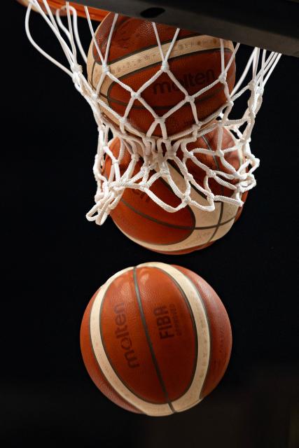 Balls come through the hoop during a warm-up prior to the 2026 FIBA Women's Basketball World Cup Group A match between Japan and Mali at the Berlin Arena in Berlin on September 4, 2026. (Photo by Odd ANDERSEN / AFP)