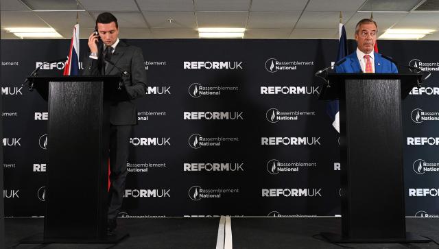Reform UK Leader Nigel Farage (R) and President of French far-right party Rassemblement National (RN) Jordan Bardella host a joint press conference on the second day of the annual Reform UK party conference at the NEC in Birmingham, central England on September 4, 2026. (Photo by Oli SCARFF / AFP)