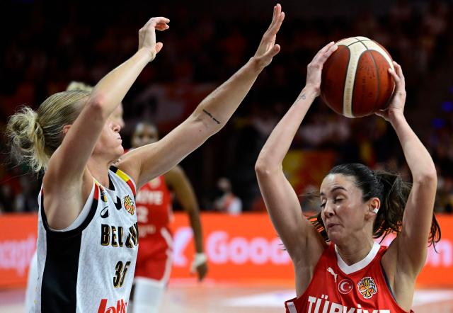 Belgium's guard #35 Julie Vanloo tries to block Turkey's point guard #04 Olcay Cakir during the 2026 FIBA Women's Basketball World Cup Group C match between Belgium and Turkey at the Max-Schmeling-Halle in Berlin on September 4, 2026. (Photo by John MACDOUGALL / AFP)