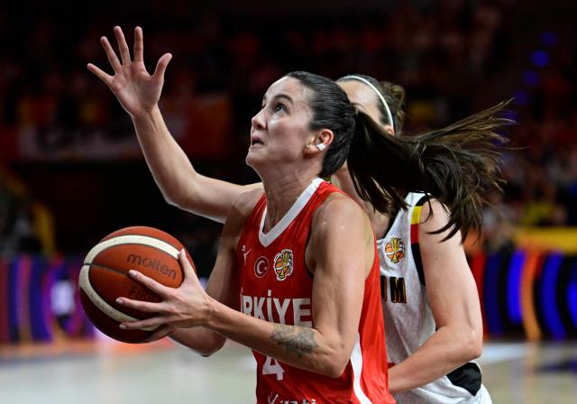 Turkey's point guard #04 Olcay Cakir (front) moves past Belgium's small forward #06 Antonia Delaere during the 2026 FIBA Women's Basketball World Cup Group C match between Belgium and Turkey at the Max-Schmeling-Halle in Berlin on September 4, 2026. (Photo by John MACDOUGALL / AFP)