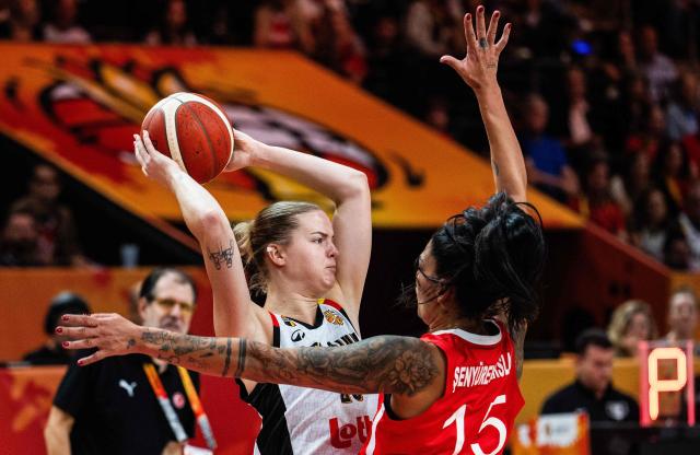Turkey's power forward #15 Tilbe Senyurek Arslan (R) tries to block Belgium's center #25 Becky Massey during the 2026 FIBA Women's Basketball World Cup Group C match between Belgium and Turkey at the Max-Schmeling-Halle in Berlin on September 4, 2026. (Photo by John MACDOUGALL / AFP)