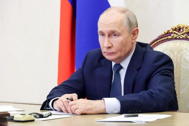 In this pool photograph distributed by the Russian state agency Sputnik, Russia's President Vladimir Putin holds a meeting of Russia's Security Council in Moscow on September 4, 2026. (Photo by Sergei ILYIN / POOL / AFP)
